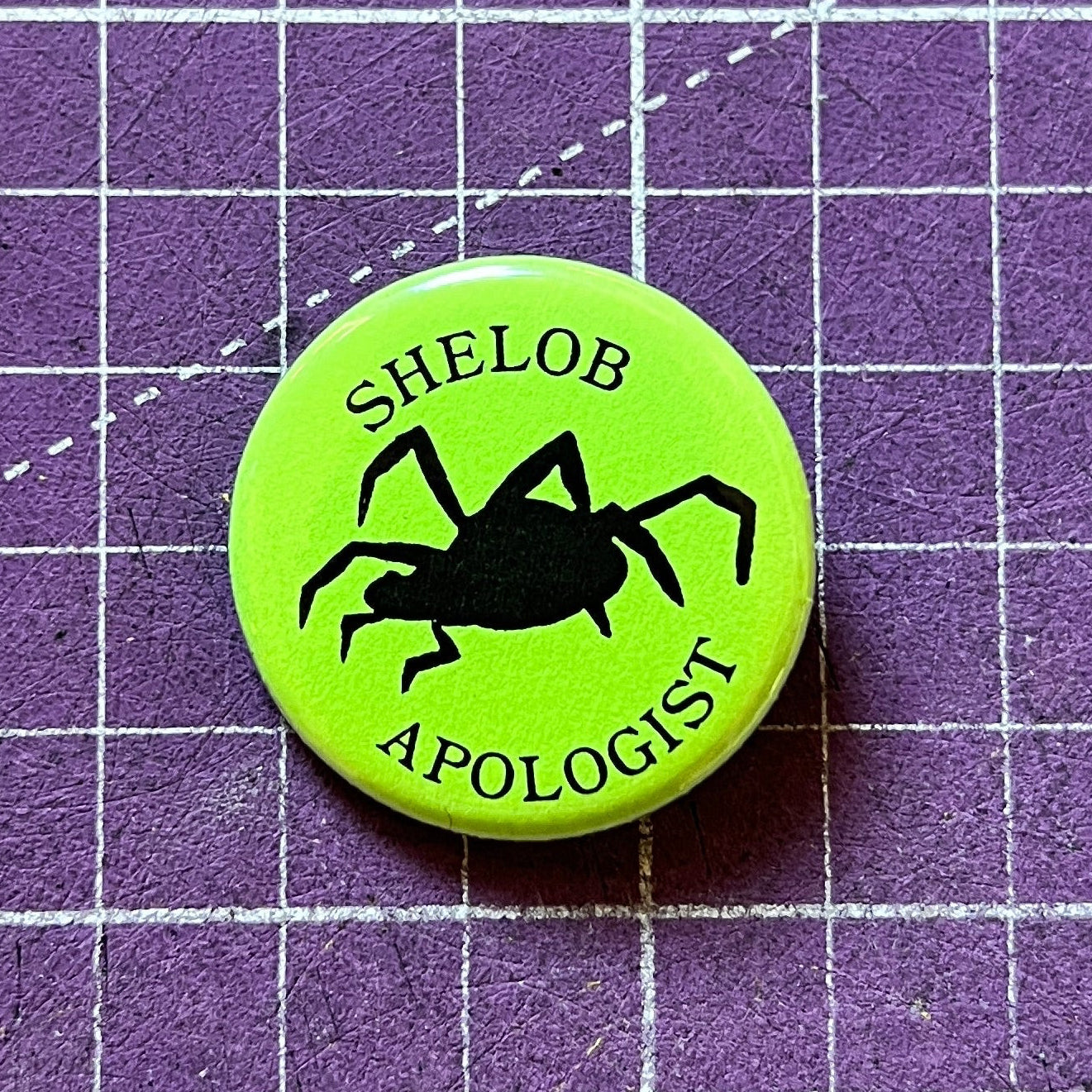 shelob apologist pin 1.25X1.25